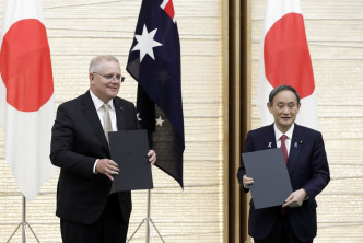 日本澳洲簽署雙邊防衛協定。AP圖片