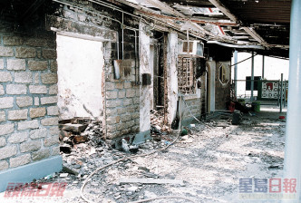 喜灵洲戒毒所越南仓被放火烧通顶。资料图片