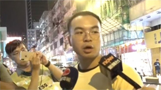 王先生称被普通话男子驱赶。港台电视截图