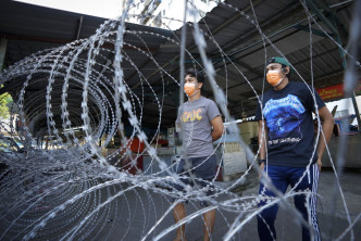 马来西亚宣布，全国在下星期二起实施全面封锁。AP图片