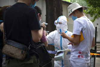 北京为民众进行病毒检测。AP图片