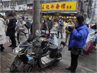 北京又指聚餐人数不应多于10人。AP资料图片
