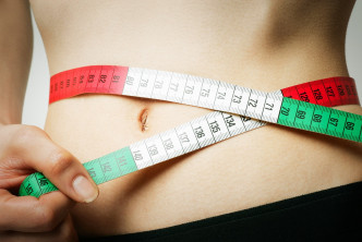 肥胖是容易患上癌症因素之一。资料图片