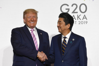 特朗普也和东道主日本首相安倍晋三会面。 AP图片