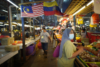 馬來西亞疫情開始緩和。AP圖片