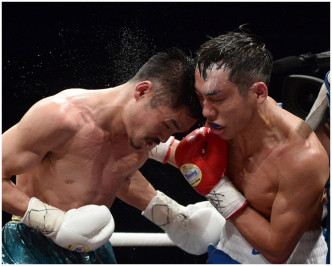 香港拳擊運動員曹星如（右）日本拳擊運動員河野公平(左)。（資料圖片）