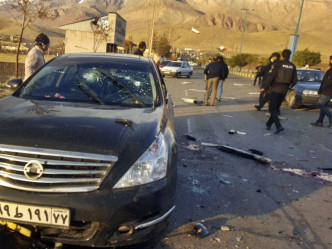 有持机关枪的恐怖分子，向法赫里扎德乘坐的车开火。AP图片