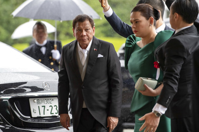 菲律宾总统杜特尔特出席日皇德仁的登位仪式，但他缩短行程。AP图片