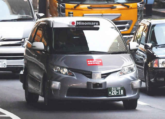 日本研发自动驾驶技术业者与计程车公司，周一开始让自动驾驶计程车载客上路试验。网图
