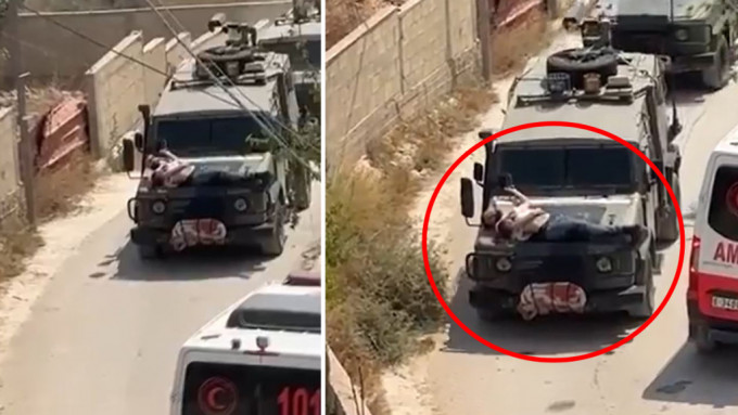 阿兹米（红圈）被绑在军用吉普车的车头盖上。（X平台）