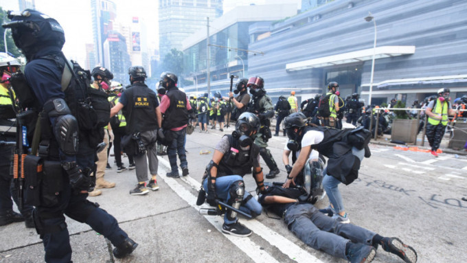 示威者于2019年9月发起「全球反极权大游行」，警方拘捕多人。 资料图片