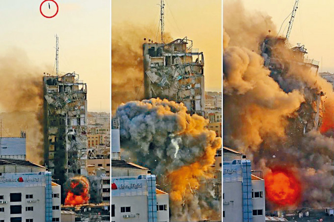 ■以軍的導彈（圓圈）擊中、摧毀加沙一座十四層高的大樓。