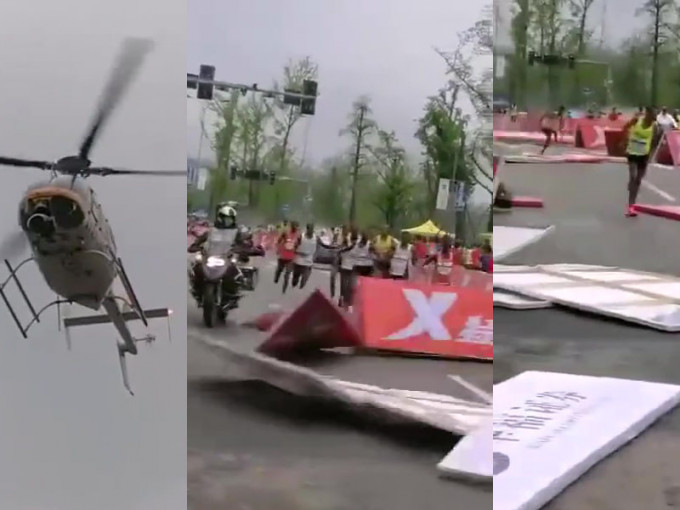 重庆马拉松一架直升机因飞得太低，吹散了分隔板，令一名选手受伤。(网图)