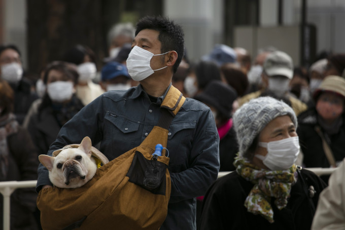 日本新增71宗新型冠狀病毒確診個案，創當地本地感染病例的單日最大增幅。AP
