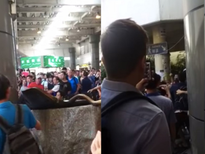 现场是大埔墟站，多名市民扭打一起。网民Hung Wing Kei影片截图