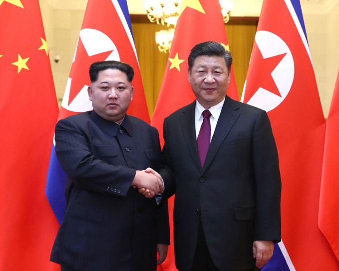 金正恩(左)访问中国，北韩传媒形容「朝中友好重大契机」。资料图片