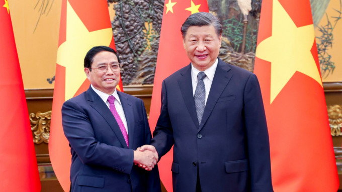 习近平会见越南总理范明政。新华社