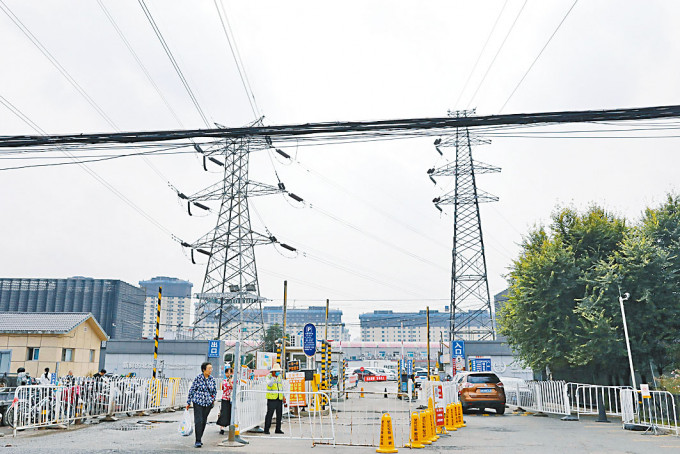 內地電荒引發全球關注。