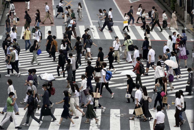 東京單日新增212宗確診。AP資料圖片