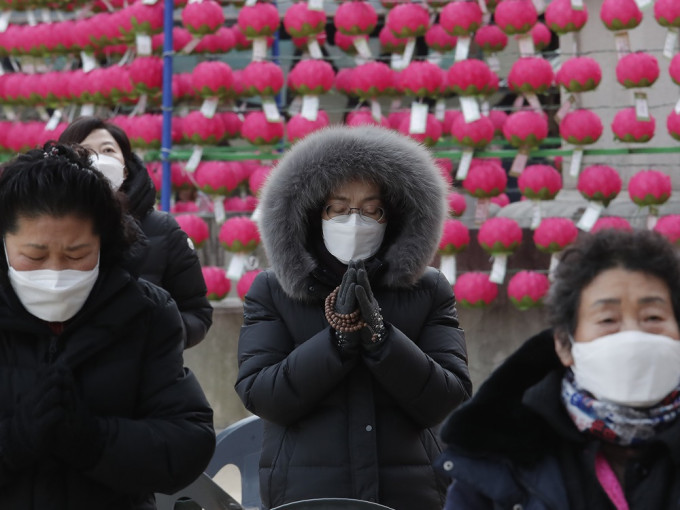 釜山宣布将防疫阶段提升至第三阶段，封城三天。AP图片