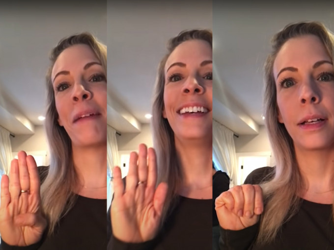 加拿大妇女基金会示范如何在聊天时展示「540」手势。 （片段截图）