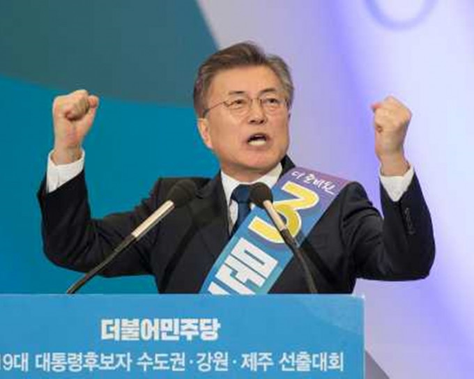 文在寅致词指，将扫除不公不义，将重建南韩的秩序。（新华社）