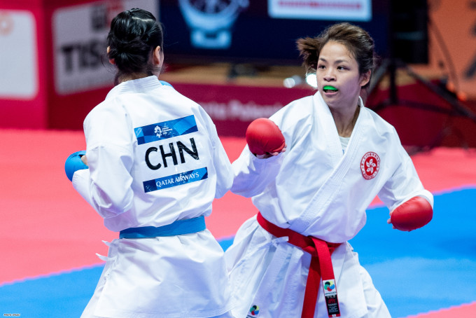 蔡韻瑜(右)在女子組手61公斤級賽事奪銅。相片由港協暨奧委會提供