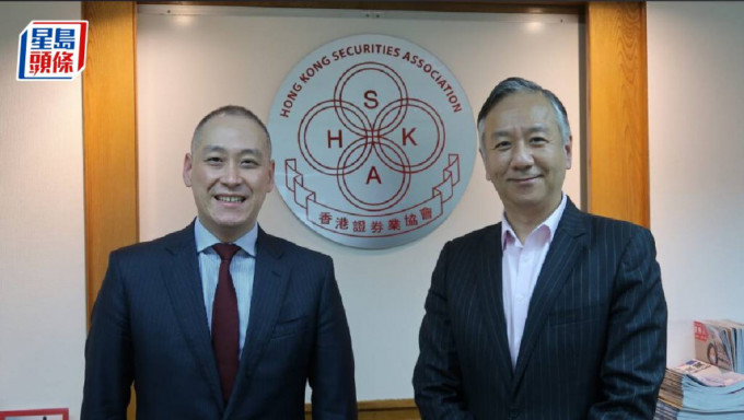 香港證券業協會主席、金融服務界議員李惟宏（左）；中銀國際證券執行董事兼香港證券業協會董事白韌（右）