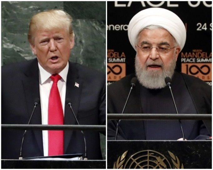 鲁哈尼(右)表示，伊朗不想与美国打仗。AP