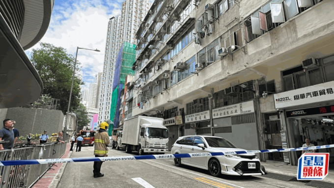 永康街有大厦单位出现裂痕，警方及消防接报到场。刘汉权摄