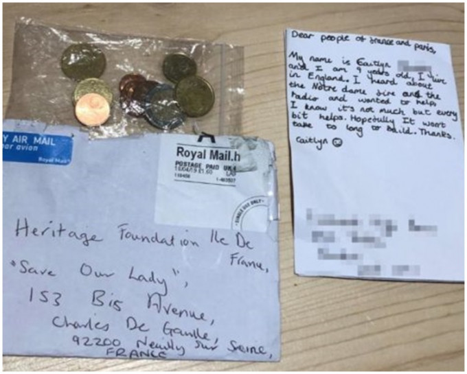 女童把錢捐給法國文化遺產基金會還附有一封信。AP