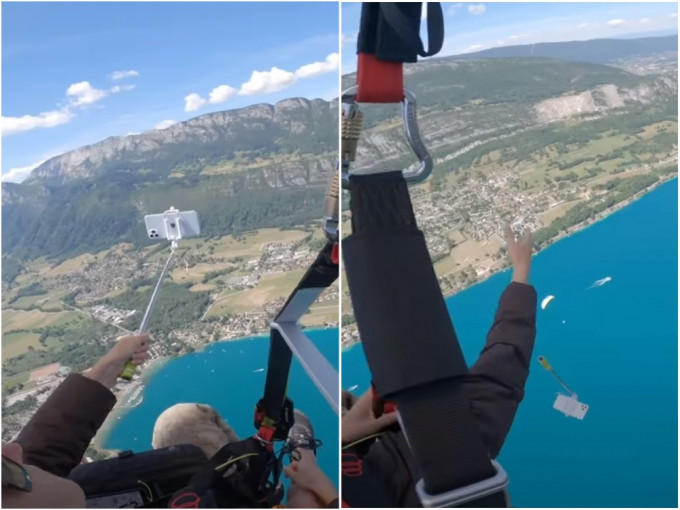 美國女遊客玩飛行傘，換手時不幸將手機從5000多呎高空跌下。影片截圖