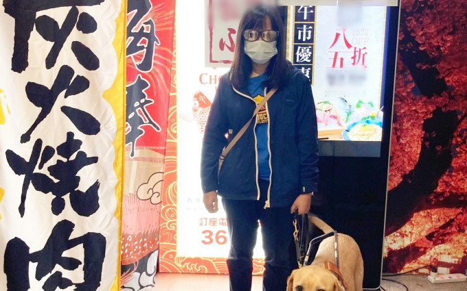 视障朋友咏文与导盲犬Delta。失明人协进会 Facebook 相片