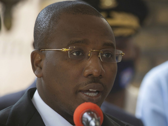 海地临时总理约瑟夫同意交出权力下台。AP图片