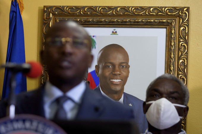 海地临时总理约瑟夫同意交出权力下台。AP图片