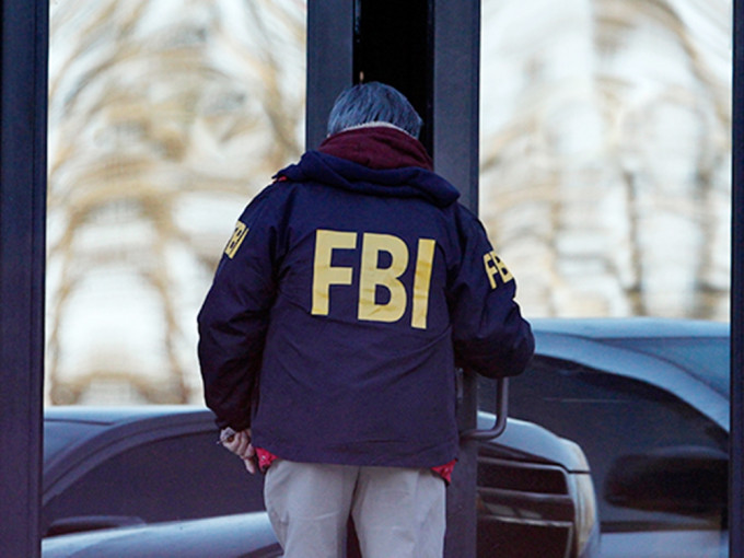 FBI利用局内女职员照片作饵。路透社图片