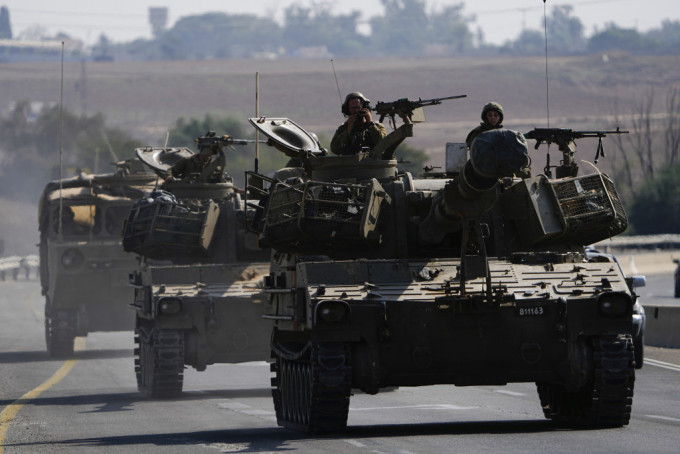 以軍連日擴大在加沙地帶的地面攻勢後，宣布已完成包圍加沙城。美聯社