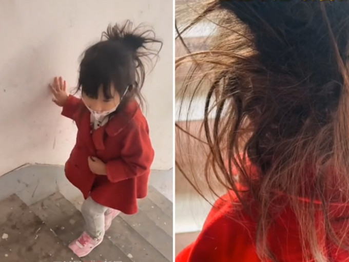 南京一名女童與爸爸一同隔離14天後，頭髮嚴重打結亂如一堆「雜草」。影片截圖