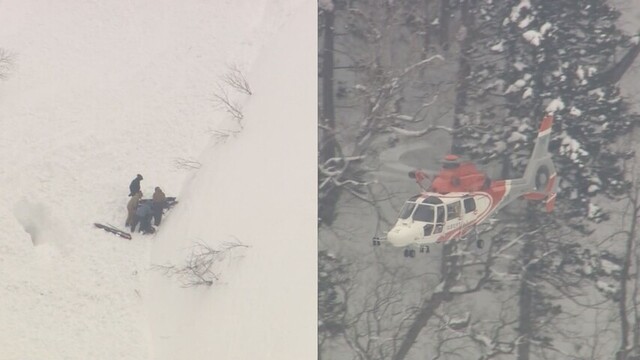 北海道羊蹄山发生雪崩，警方出动直升机救援。网上图片