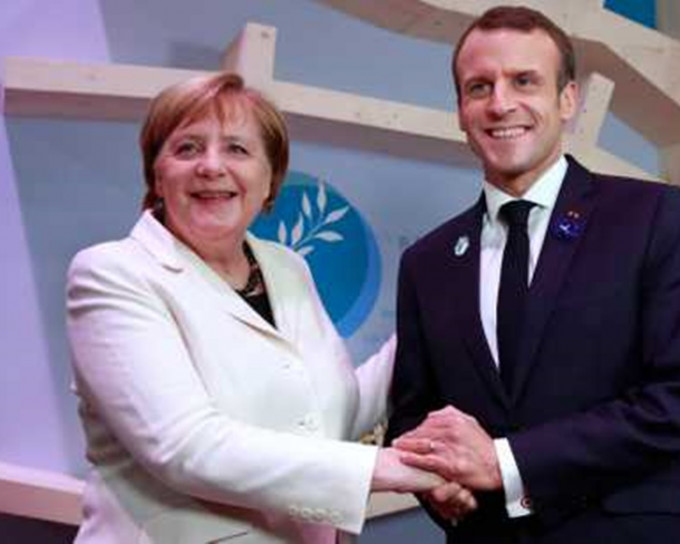 （左起）德國總理默克爾與法國總統馬克龍。AP