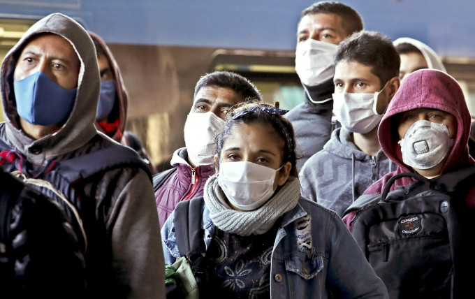 新型肺炎肆虐全球，確診人數突破200萬。AP圖片