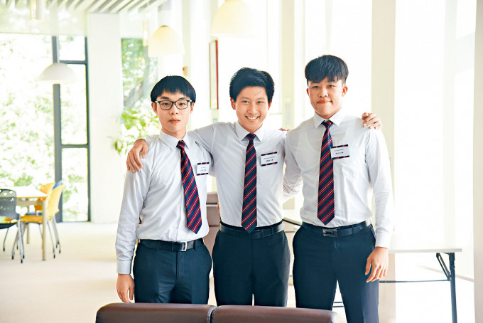 三名拔萃男書院應屆IB文憑試狀元，左起彭彥程、曾慶倫和康焯桓會見傳媒。