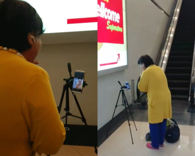 大媽在西環西寶城惠康電梯口前開抖音唱歌。網民Alan Chan片段截圖