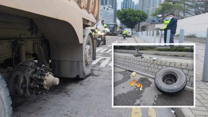 泥頭車行駛期間甩轆擊中一名工人。林思明攝