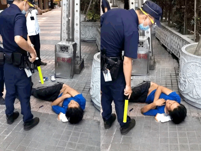 台男無戴口罩躺台北車站遭警勸導。爆料公社FB影片截圖