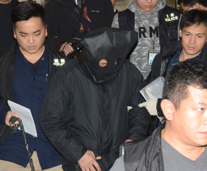 被告萧伟昌当日被警方拘捕。资料图片