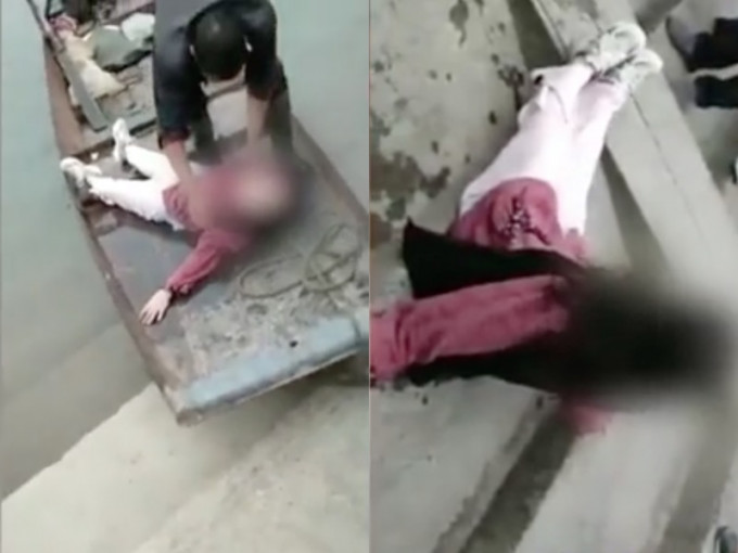 女子被救後坐在地上抖腿撒嬌。影片截圖
