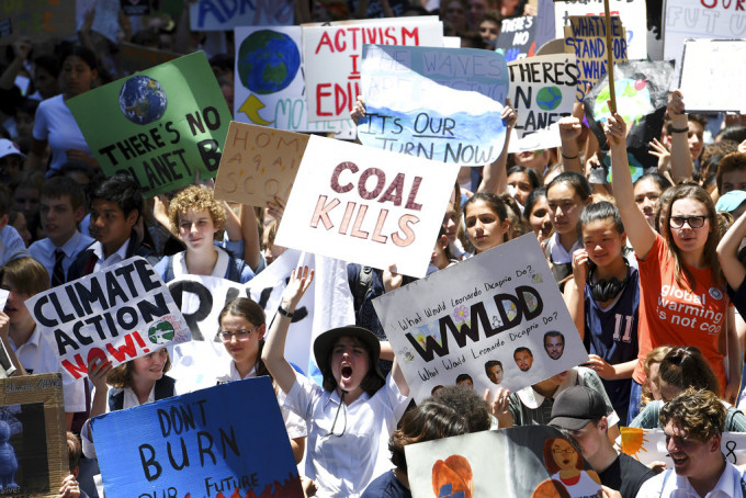澳洲中小学生集体罢课示威。AP图片
