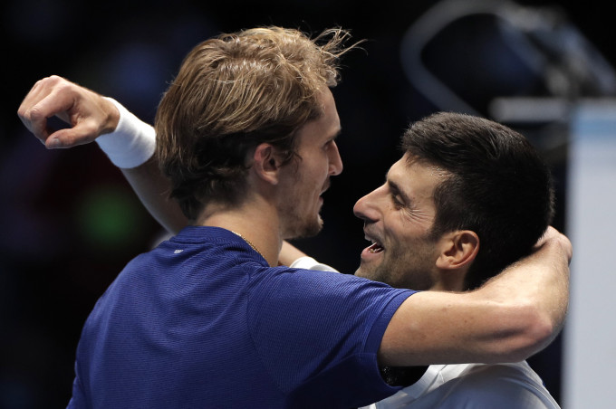 ATP年終賽四強，施維利夫和杜高域賽後互抱。 Reuters