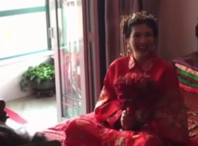 內地網上流傳一段山東太原「普通官員」嫁孫女的片段。影片截圖